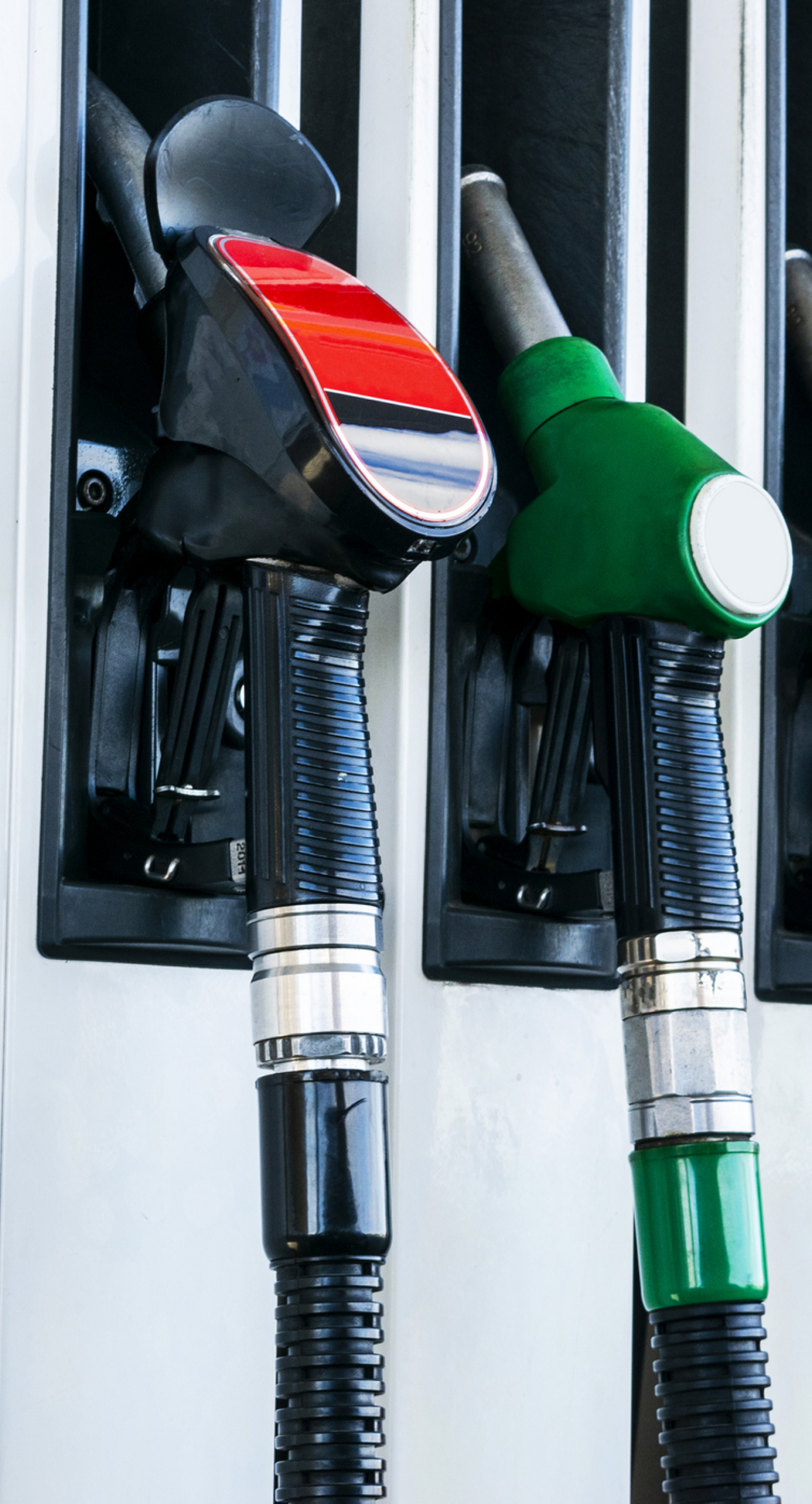 Mechanic hand was opening the radiator cap to check the coolant level